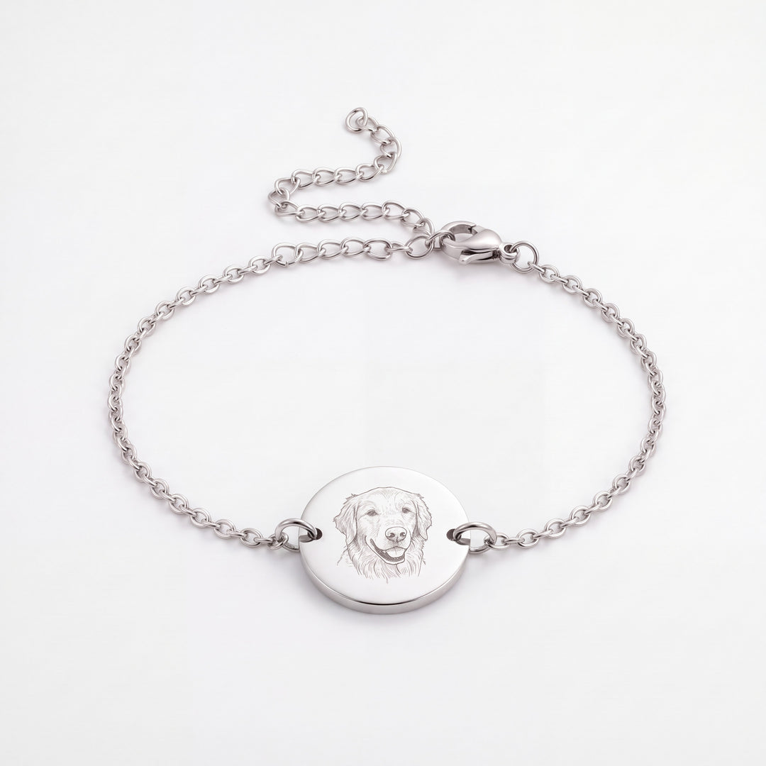 Stainless steel chain bracelet with a round disc engraved with a golden retriever line drawing