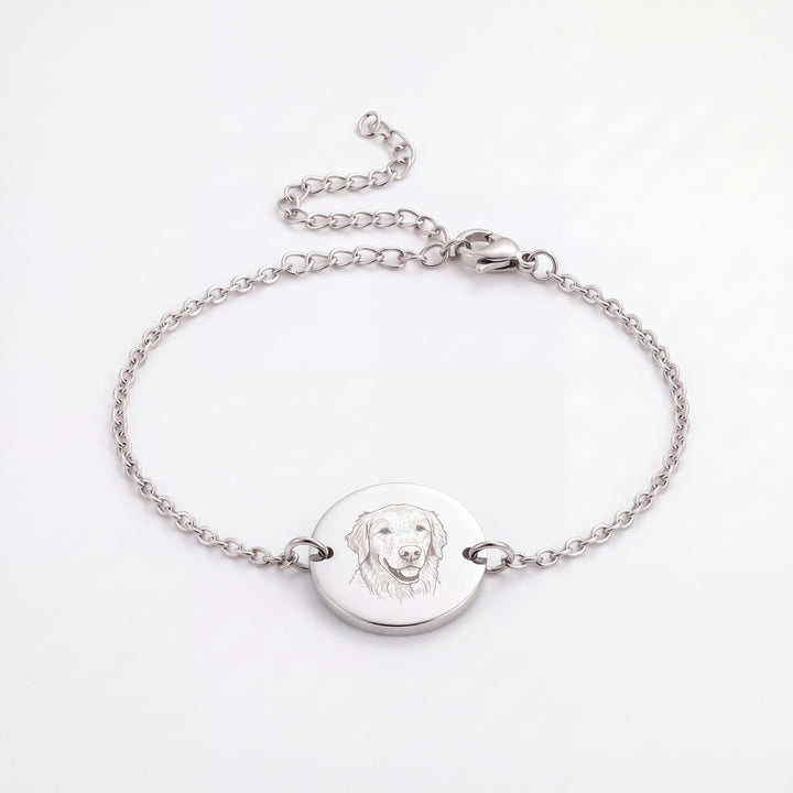Stainless steel chain bracelet with a round disc engraved with a golden retriever line drawing