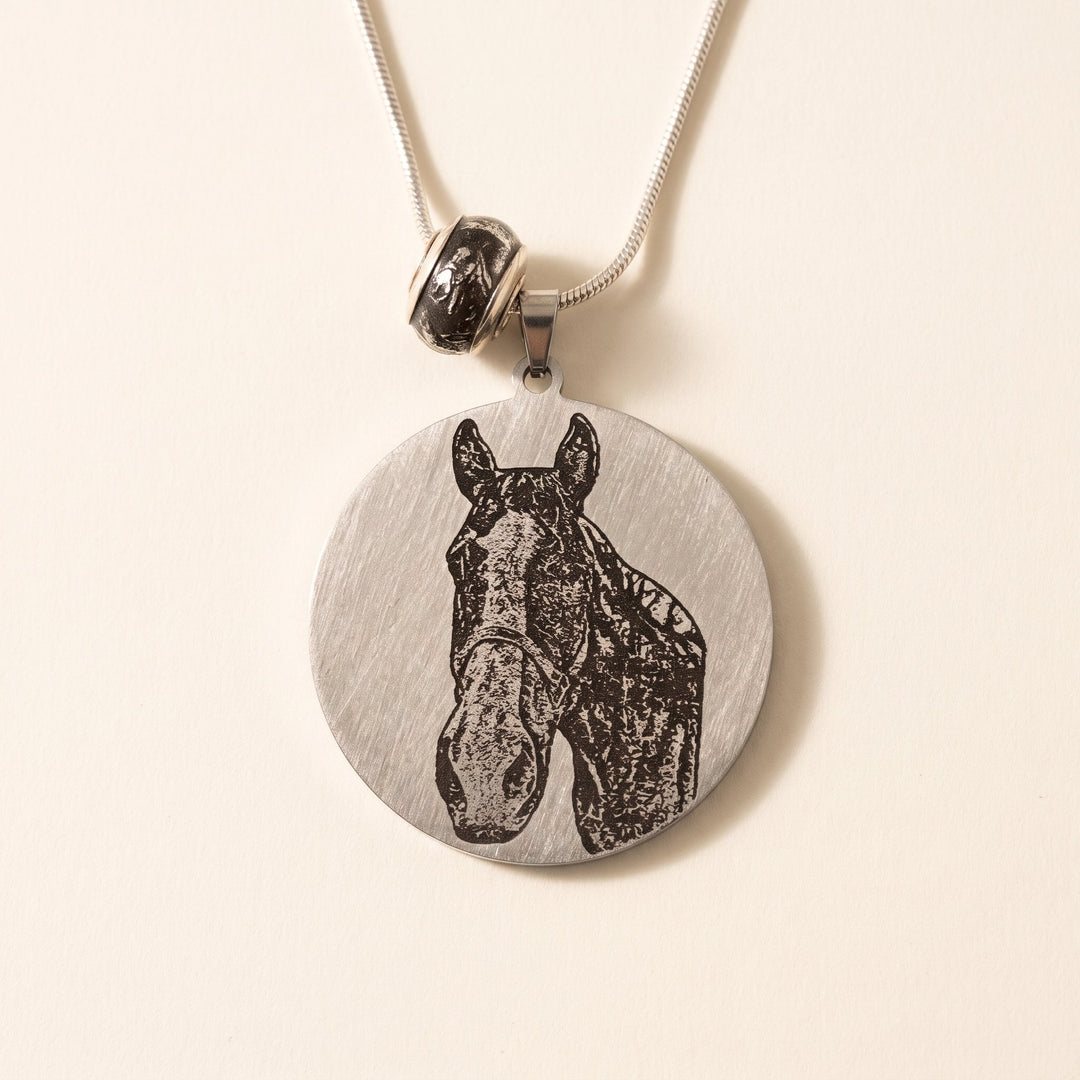 round pet photo necklace with an engraved pet portrait, silver tone