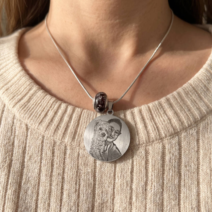 round pet photo necklace with an engraved pet portrait, worn