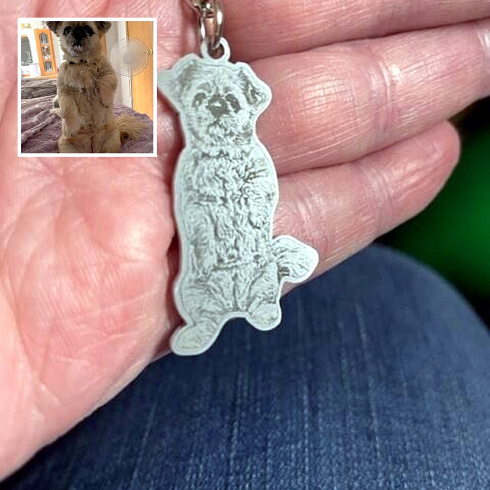 Engraved Shih Tzu keychain in a customer's hand, with the photo of Baby