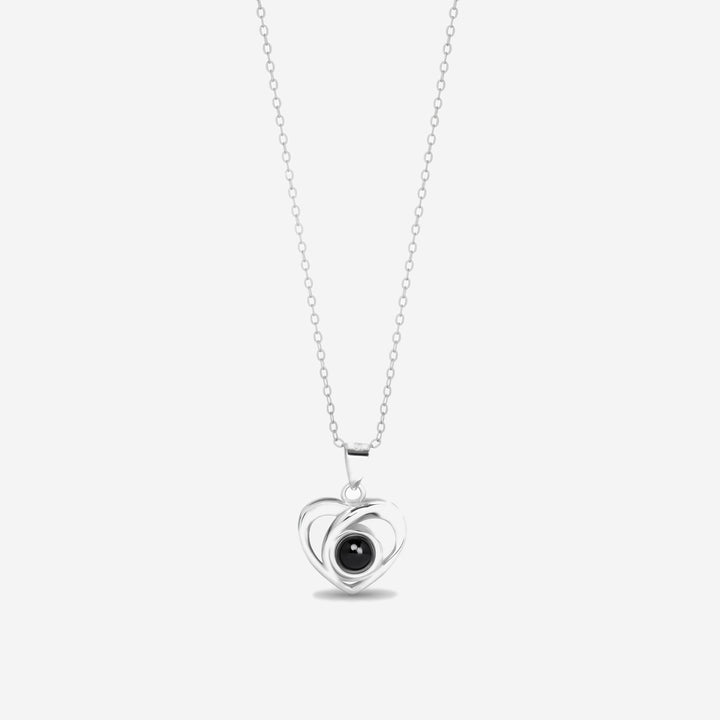 Silver crossed heart photo projection necklace