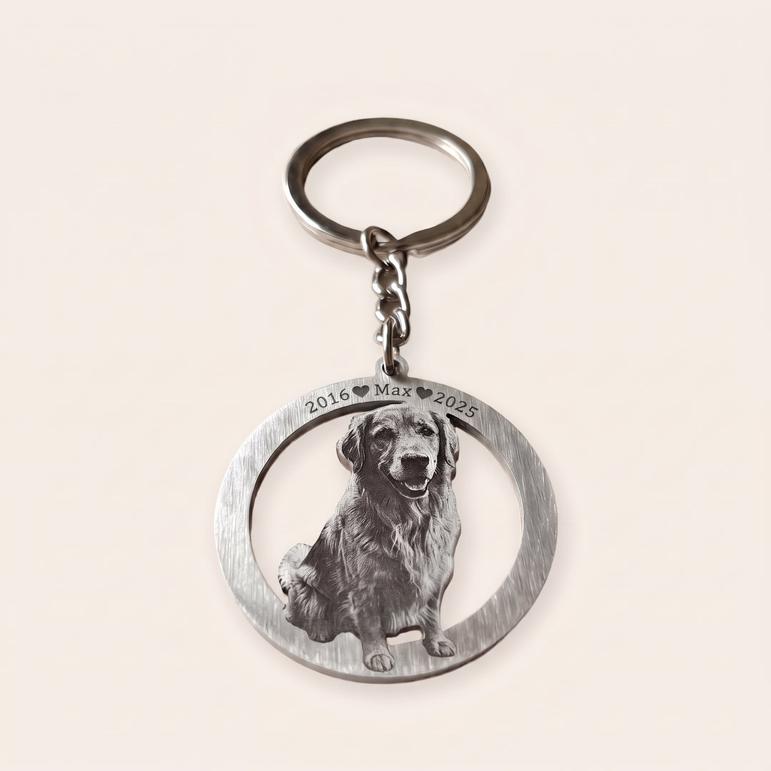 Halo dog memorial keychain in silver, engraved with a sitting golden retriever and the name Max with years