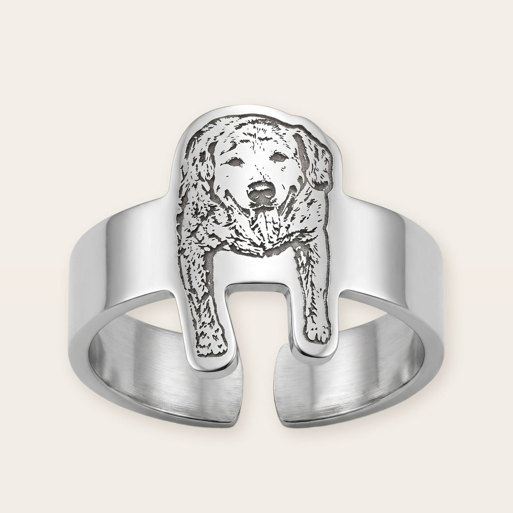 Engraved pet photo ring, silver tone, on a plain background