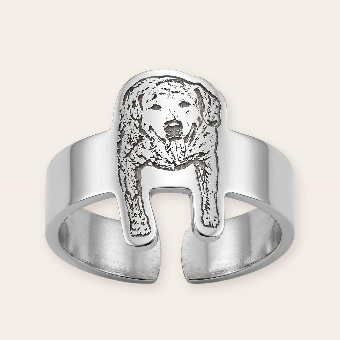 Engraved pet photo ring, silver tone, on a plain background