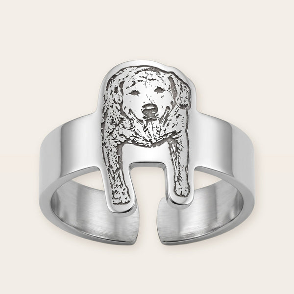 Engraved pet photo ring, silver tone, on a plain background