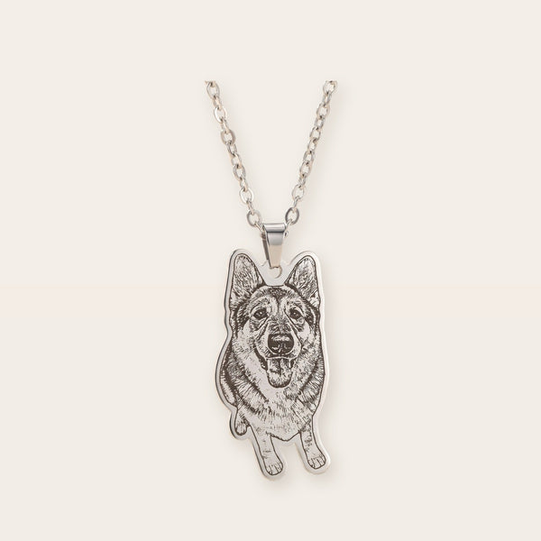 Custom pet photo necklace, silver tone, on a plain background