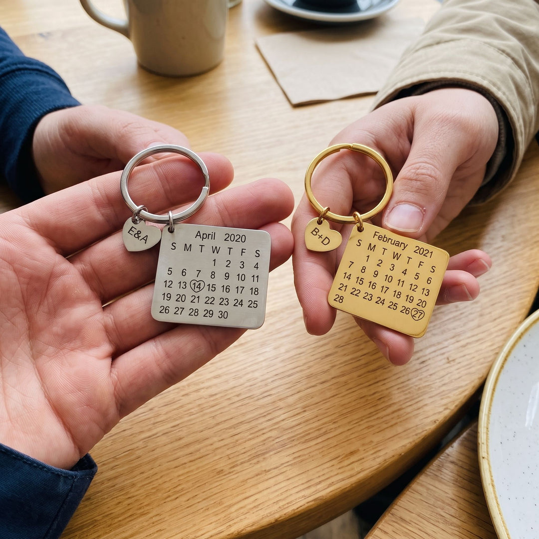 personalized calendar keychain with an engraved date, a couple holding matching pieces