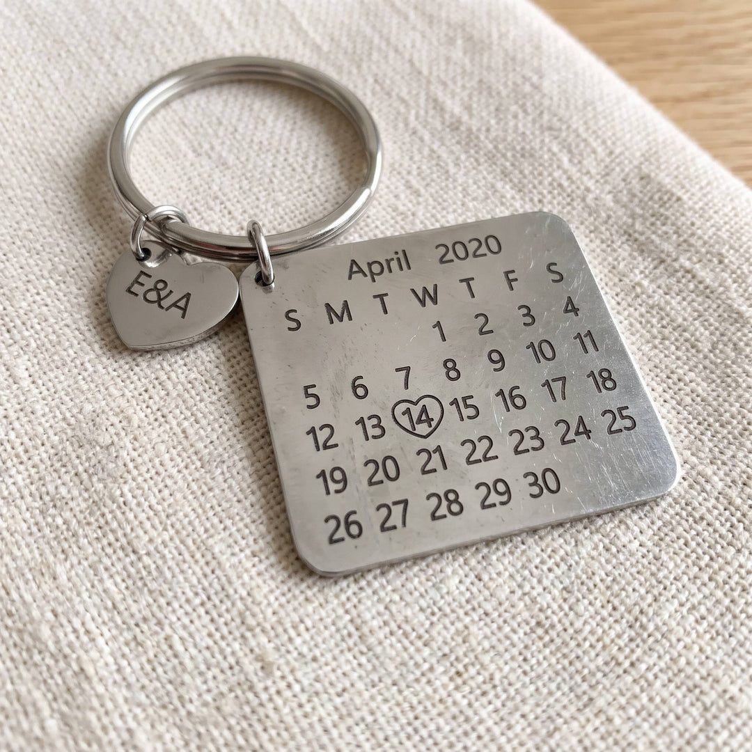 personalized calendar keychain with an engraved date, close-up of the engraving