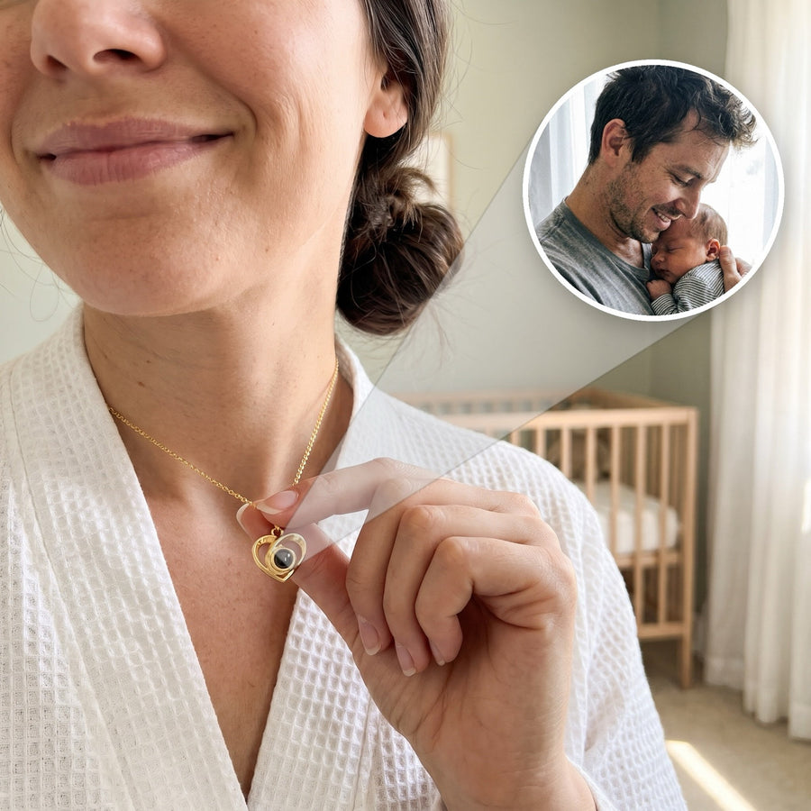 Gold heart projection necklace with a photo of dad and newborn inside